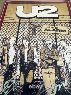 U2 -Signed Tour 11x17 Photo by 3 Band Members Bono, Edge, Clayton COA